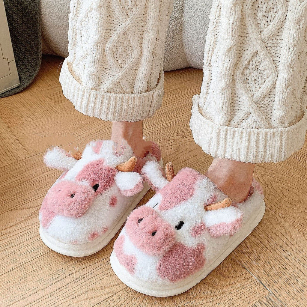 Zapatillas de vaca rosa puestas